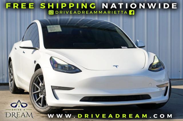 used 2023 Tesla Model 3 car, priced at $19,750