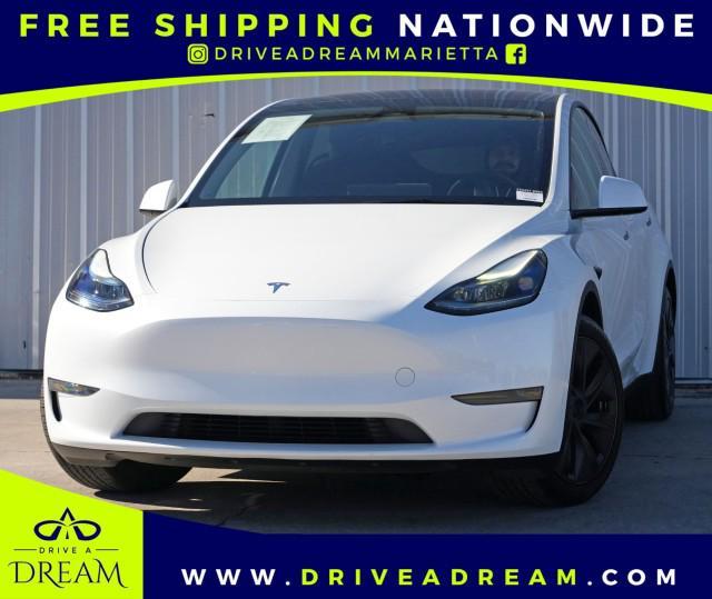 used 2024 Tesla Model Y car, priced at $28,000