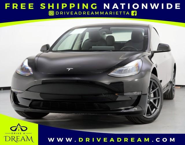 used 2023 Tesla Model 3 car, priced at $18,750