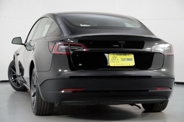 used 2023 Tesla Model 3 car, priced at $18,750