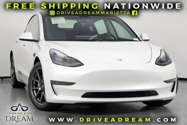 used 2023 Tesla Model 3 car, priced at $20,250