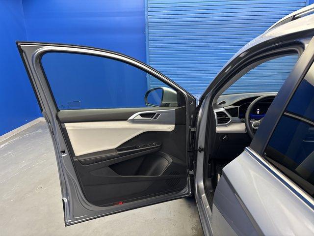 used 2025 Volkswagen Taos car, priced at $24,494
