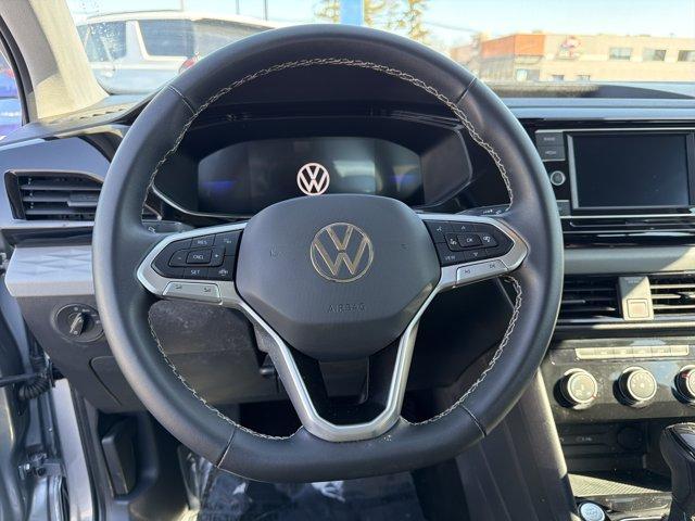 used 2023 Volkswagen Taos car, priced at $19,498