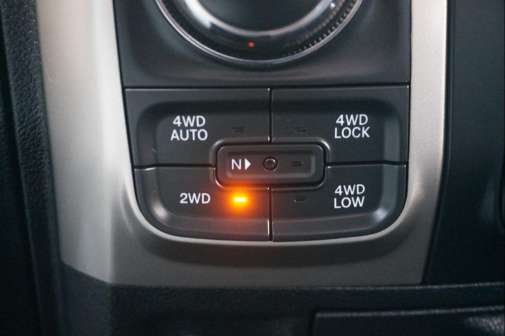 used 2018 Ram 1500 car, priced at $27,272