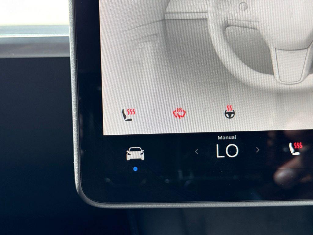 used 2025 Tesla Model Y car, priced at $40,249