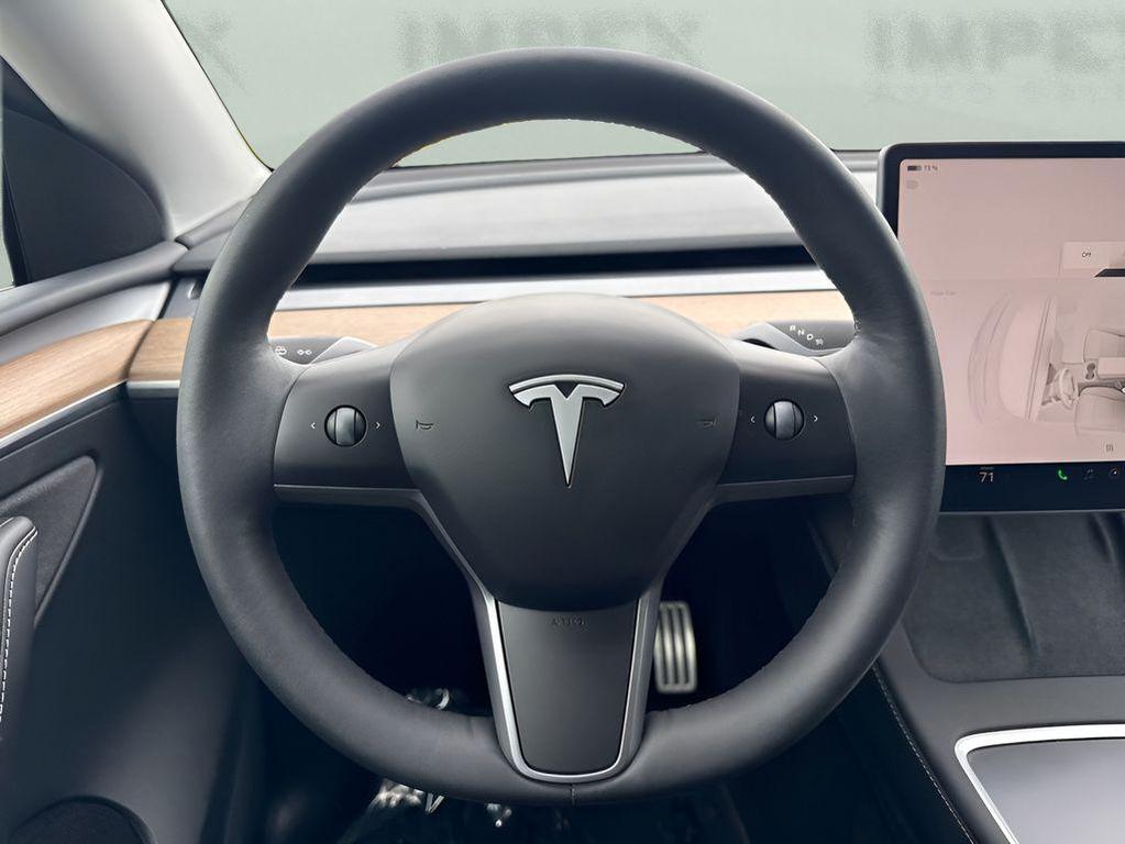 used 2023 Tesla Model Y car, priced at $30,495