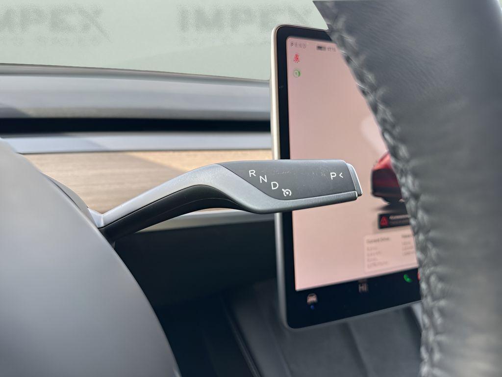 used 2023 Tesla Model Y car, priced at $32,450