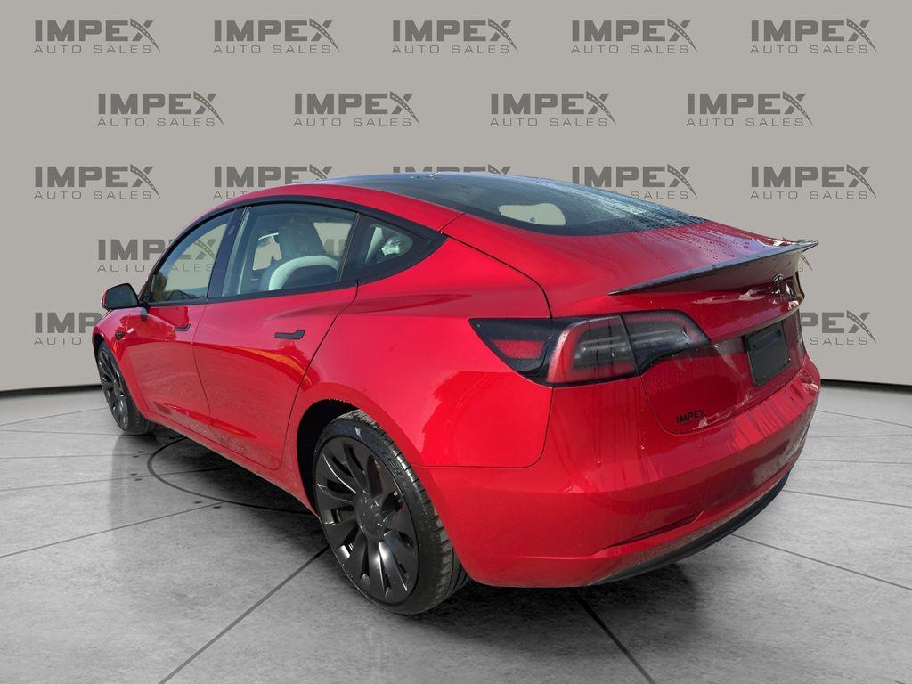 used 2023 Tesla Model 3 car, priced at $30,750