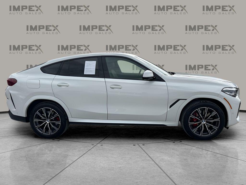 used 2023 BMW X6 car, priced at $54,550