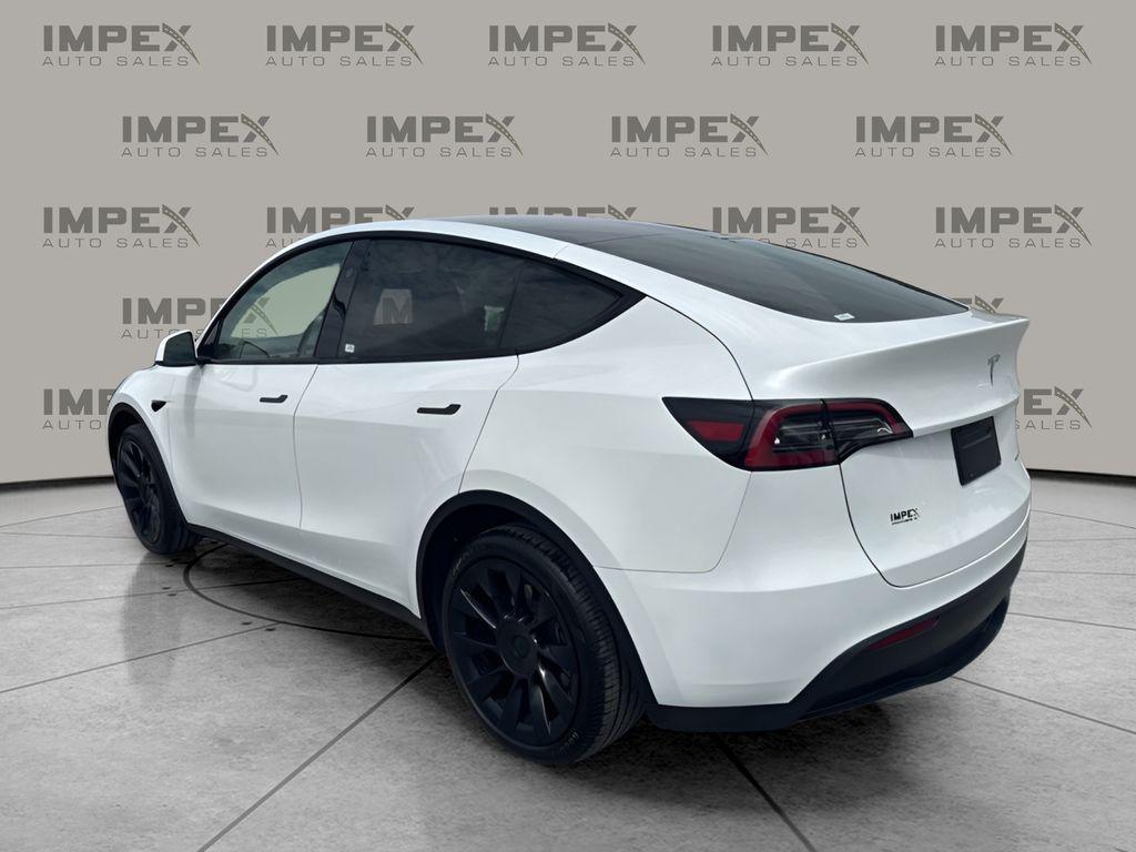 used 2024 Tesla Model Y car, priced at $39,450