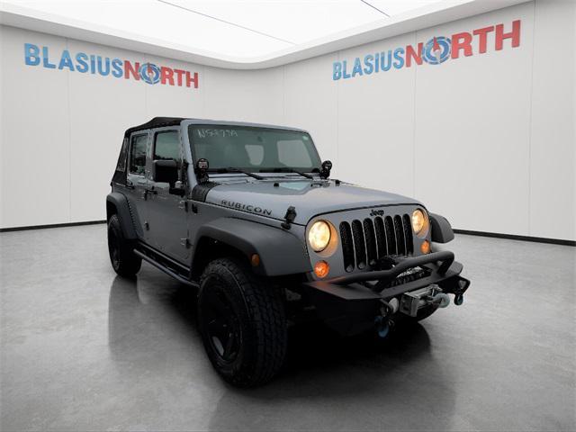 used 2015 Jeep Wrangler Unlimited car, priced at $17,479