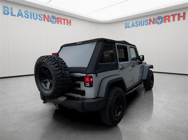used 2015 Jeep Wrangler Unlimited car, priced at $17,479