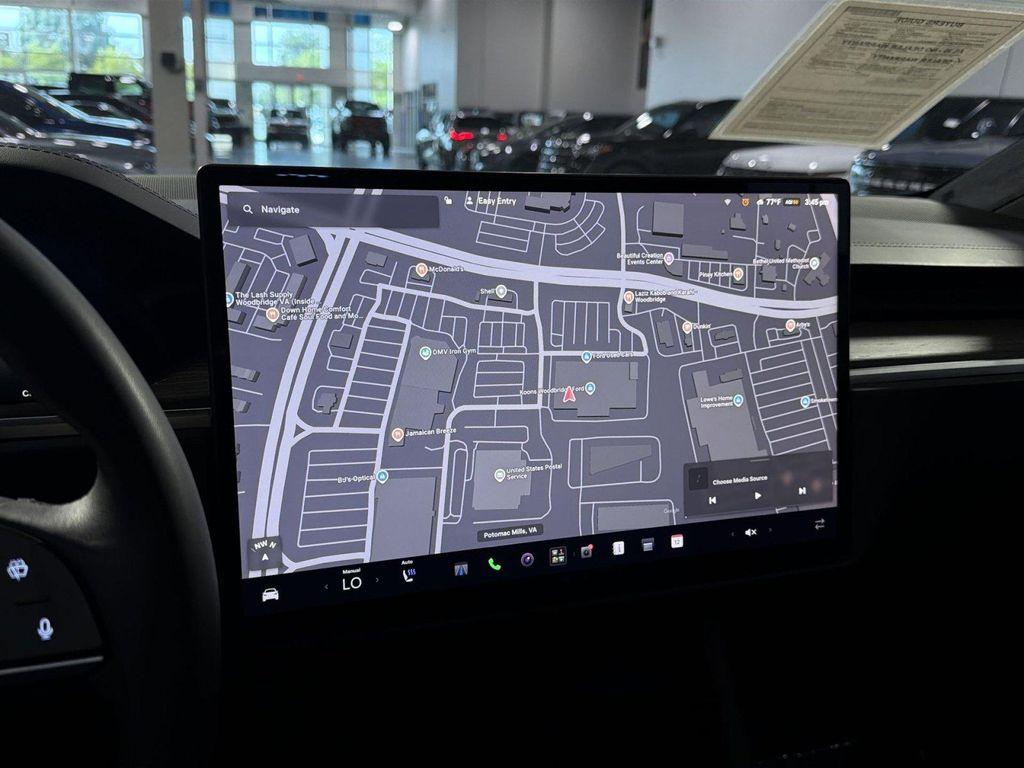used 2023 Tesla Model X car, priced at $53,245