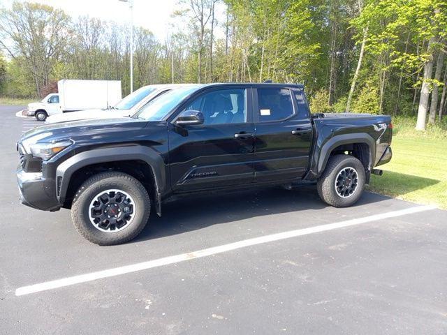 used 2024 Toyota Tacoma car, priced at $40,997