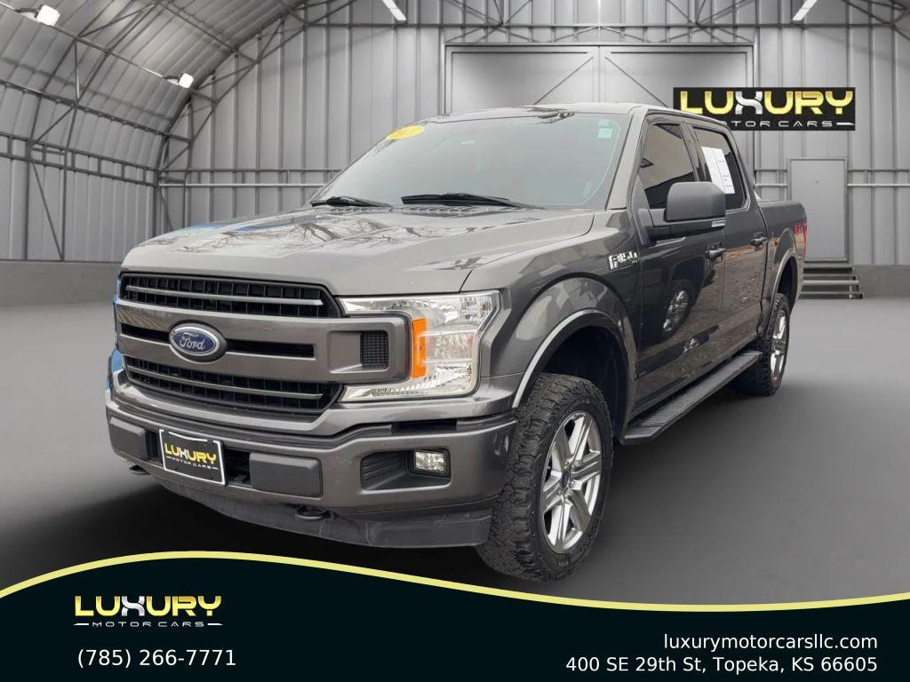 used 2018 Ford F-150 car, priced at $19,208