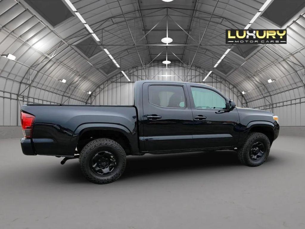 used 2022 Toyota Tacoma car, priced at $31,999