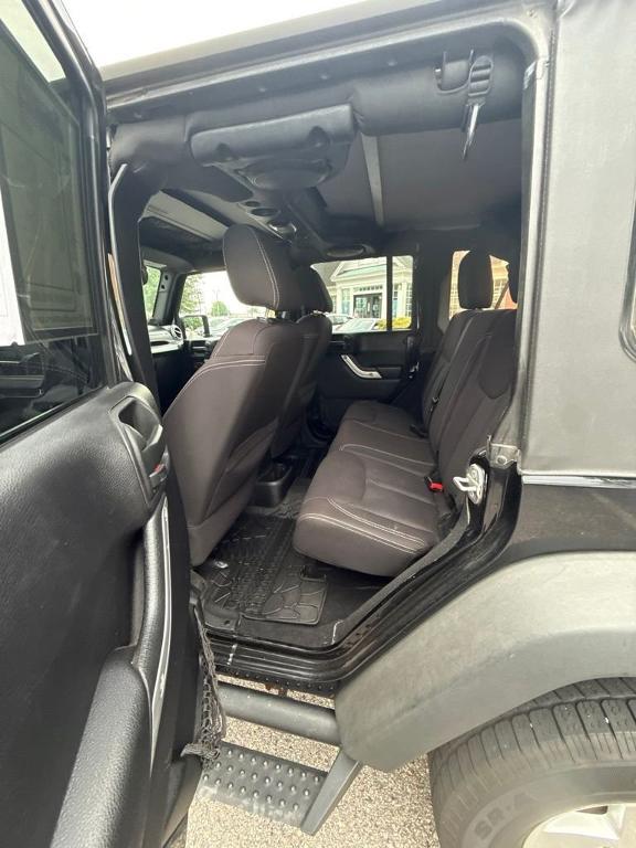 used 2014 Jeep Wrangler Unlimited car, priced at $16,897