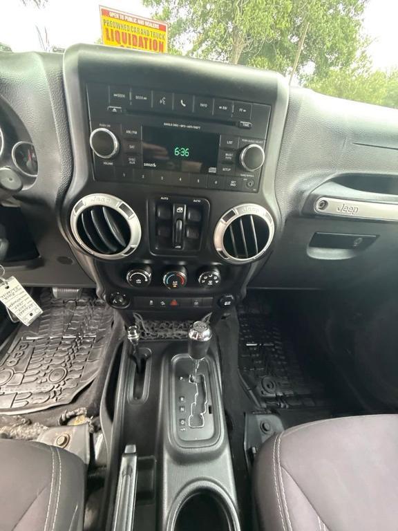 used 2014 Jeep Wrangler Unlimited car, priced at $16,897