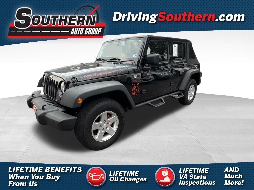 used 2014 Jeep Wrangler Unlimited car, priced at $16,897
