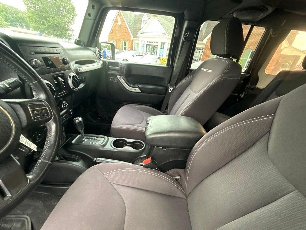used 2014 Jeep Wrangler Unlimited car, priced at $16,897