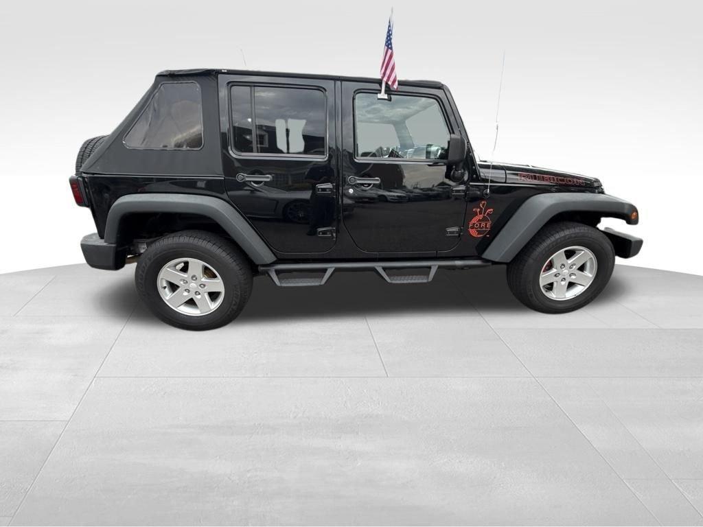used 2014 Jeep Wrangler Unlimited car, priced at $16,897