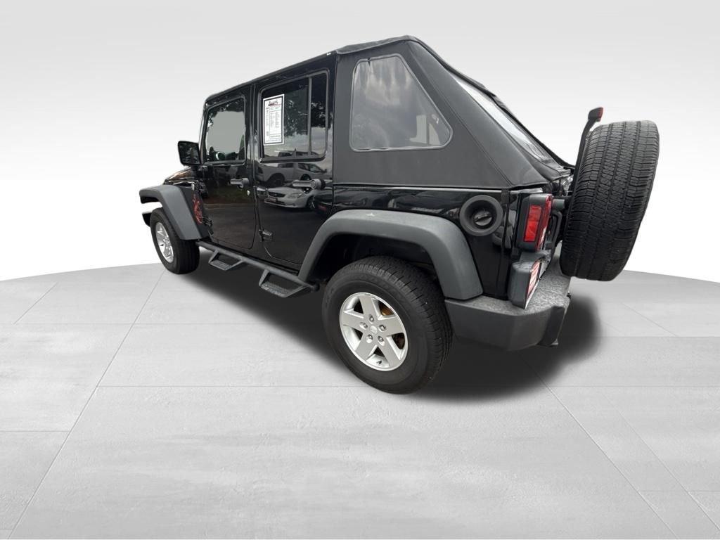 used 2014 Jeep Wrangler Unlimited car, priced at $16,897