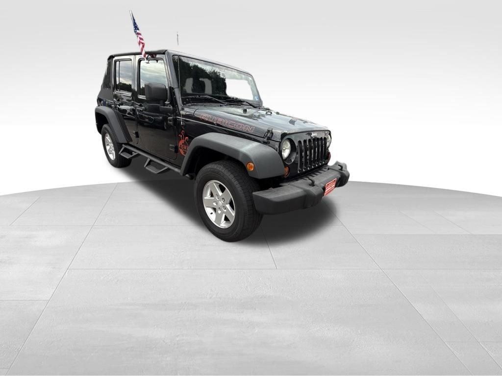 used 2014 Jeep Wrangler Unlimited car, priced at $16,897