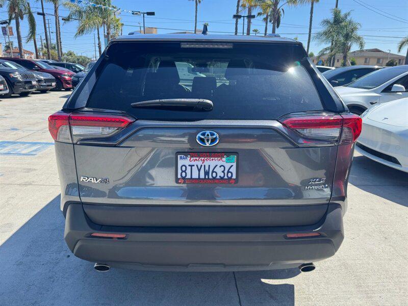 used 2021 Toyota RAV4 Hybrid car, priced at $27,950