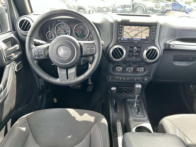 used 2015 Jeep Wrangler Unlimited car, priced at $17,825