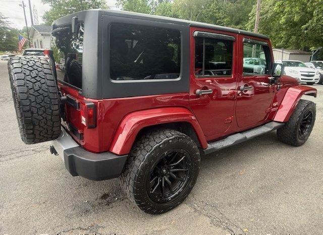 used 2013 Jeep Wrangler Unlimited car, priced at $15,997