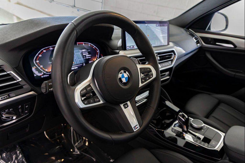 used 2025 BMW X4 car, priced at $49,488