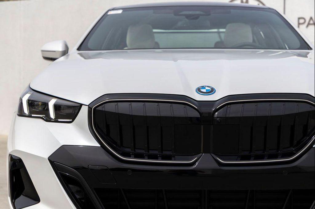 new 2026 BMW 550e car, priced at $86,875