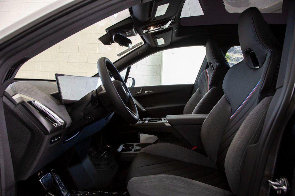 new 2026 BMW iX car, priced at $97,875