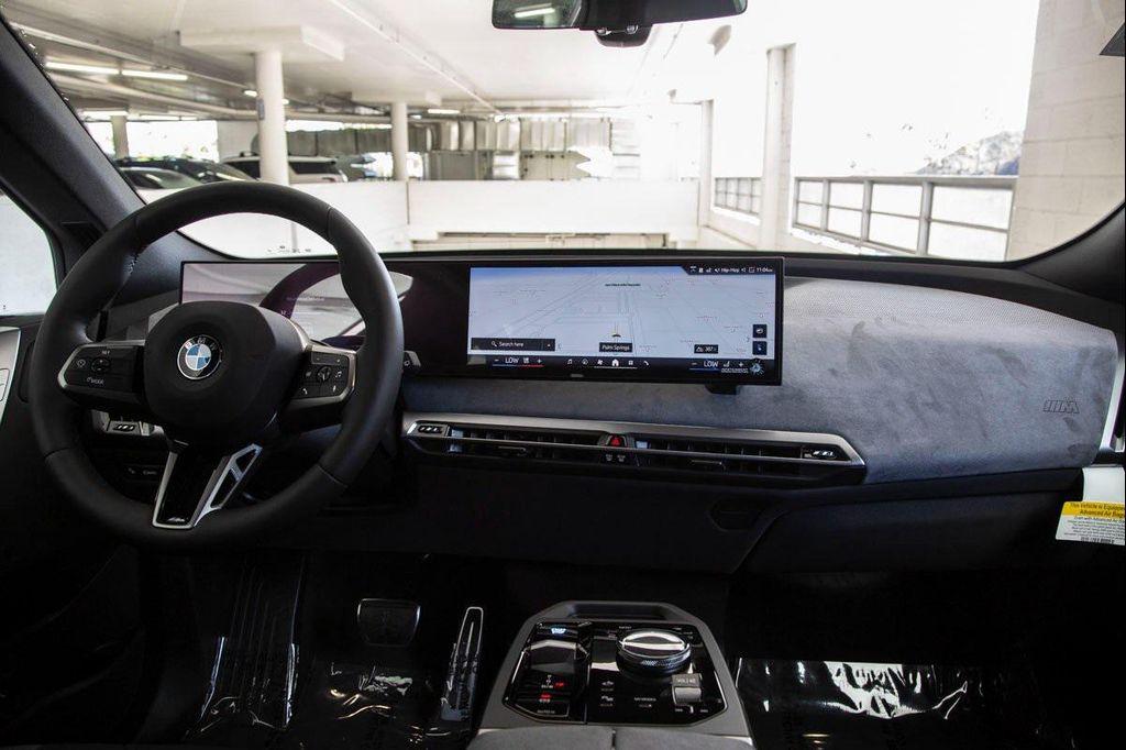 new 2026 BMW iX car, priced at $97,875
