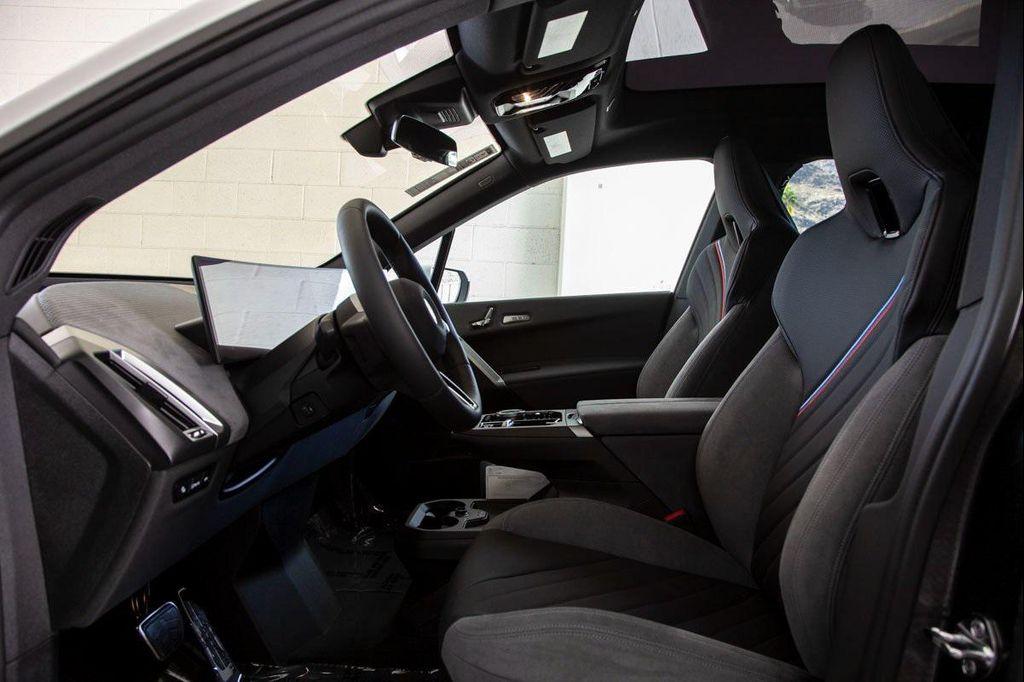 new 2026 BMW iX car, priced at $97,875