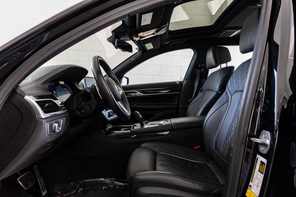 used 2022 BMW 750 car, priced at $58,688