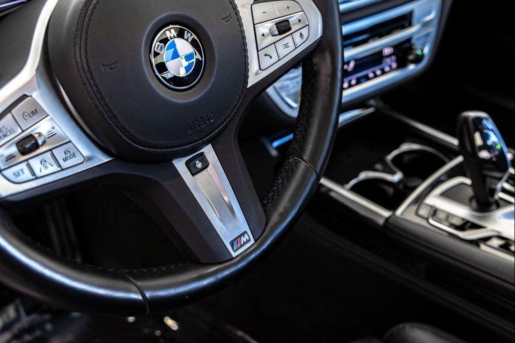 used 2022 BMW 750 car, priced at $58,688