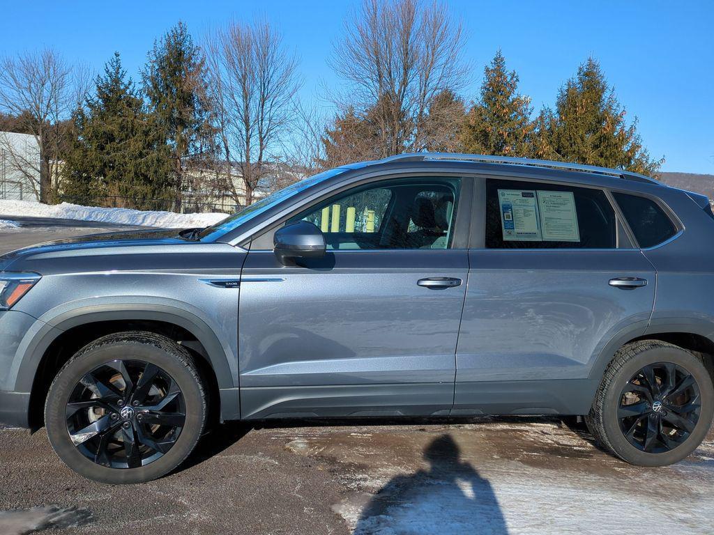 used 2023 Volkswagen Taos car, priced at $23,493