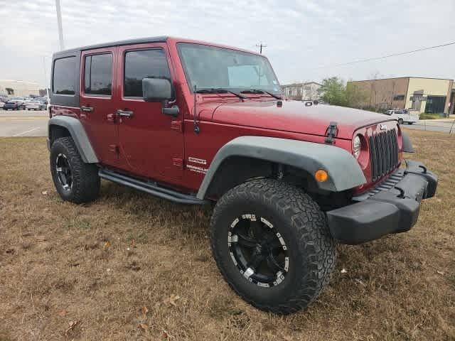 used 2013 Jeep Wrangler Unlimited car, priced at $16,695