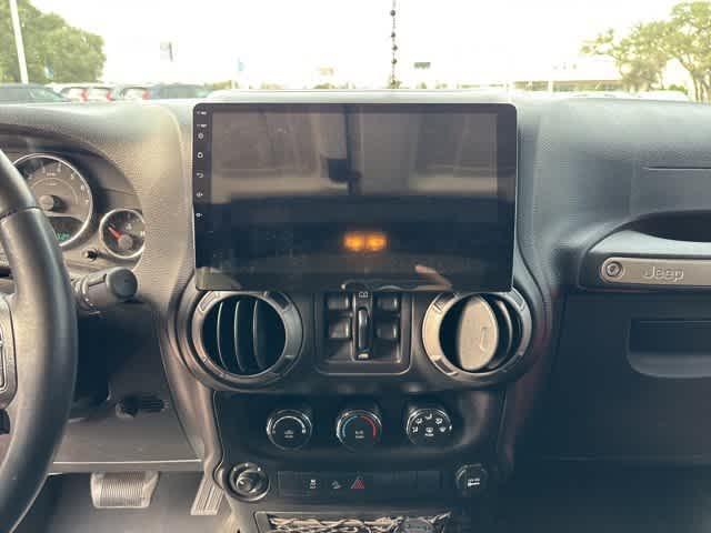 used 2015 Jeep Wrangler Unlimited car, priced at $19,495