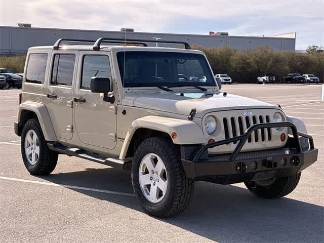 used 2011 Jeep Wrangler Unlimited car, priced at $14,595