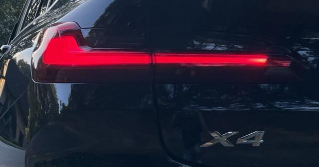 used 2023 BMW X4 car, priced at $40,295