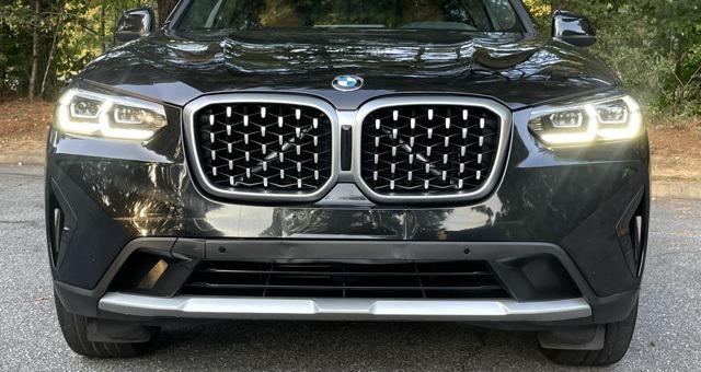 used 2023 BMW X4 car, priced at $40,295