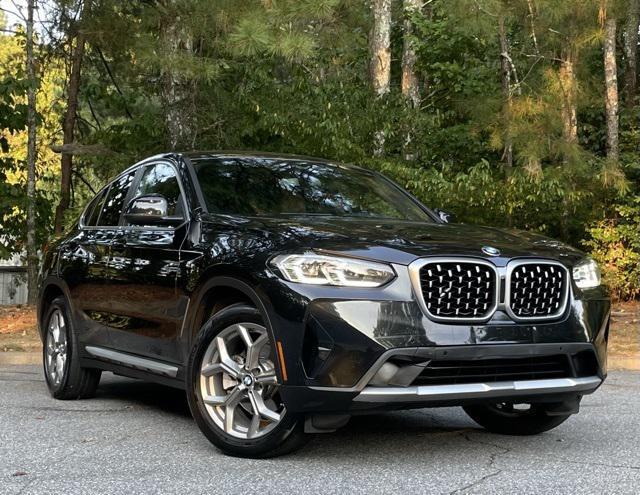 used 2023 BMW X4 car, priced at $40,295