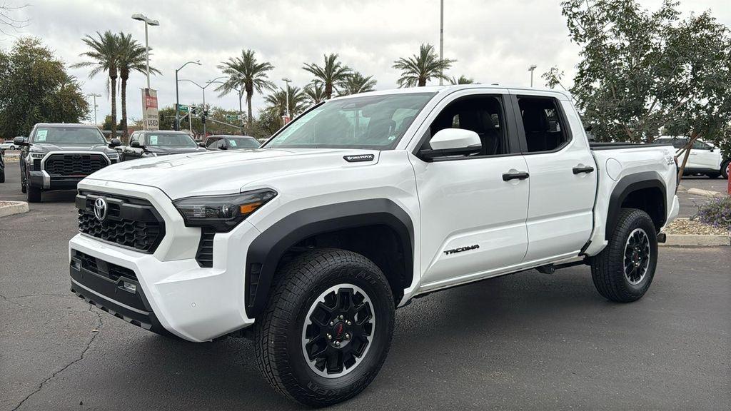 used 2025 Toyota Tacoma Hybrid car, priced at $49,899