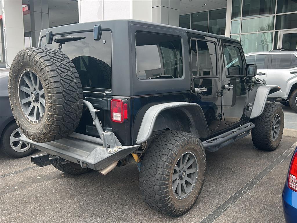 used 2015 Jeep Wrangler Unlimited car, priced at $21,981