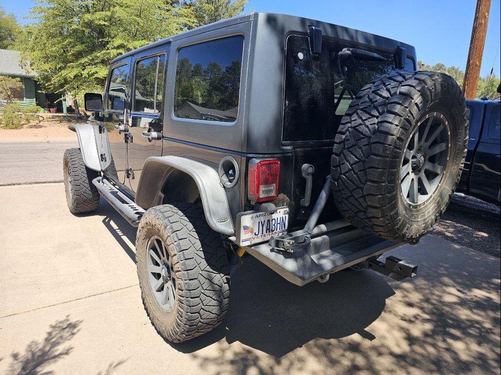 used 2015 Jeep Wrangler Unlimited car, priced at $21,981