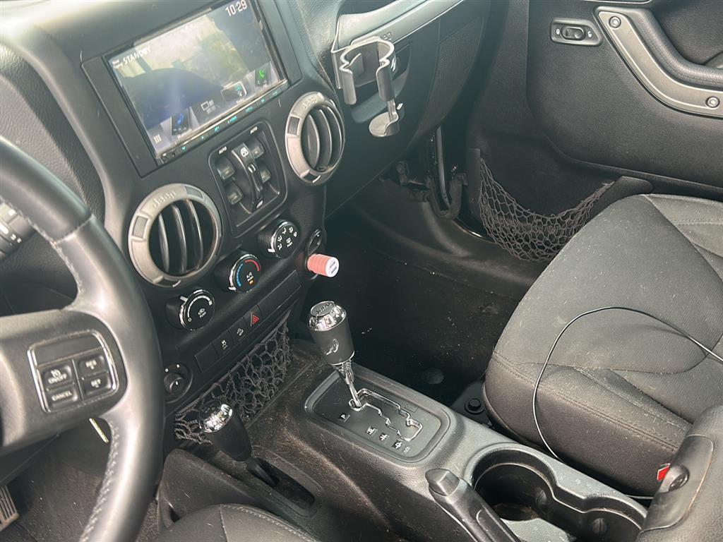 used 2015 Jeep Wrangler Unlimited car, priced at $21,981