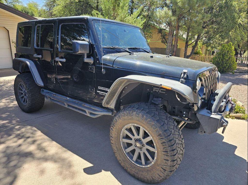 used 2015 Jeep Wrangler Unlimited car, priced at $21,981