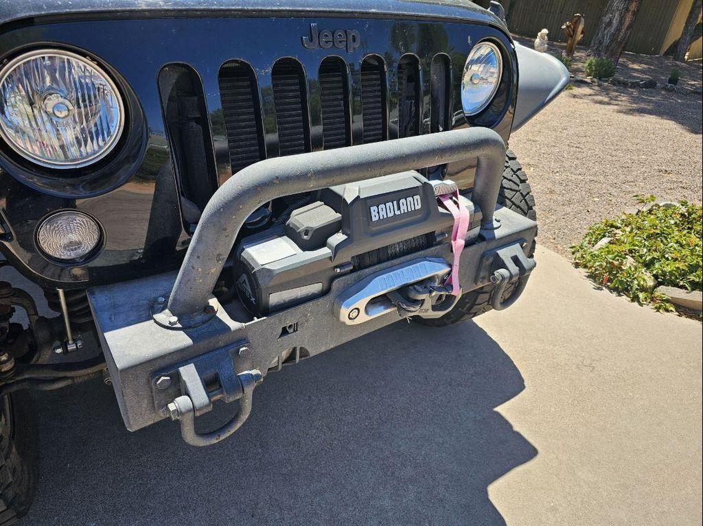 used 2015 Jeep Wrangler Unlimited car, priced at $21,981